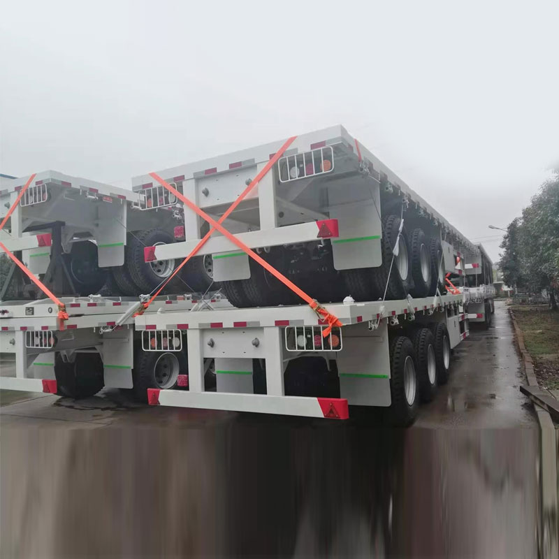 चीन 40ft 3 एक्सेल फ्लैटबेड अर्ध ट्रेलर निर्माता आपूर्तिकर्ता निर्यातक